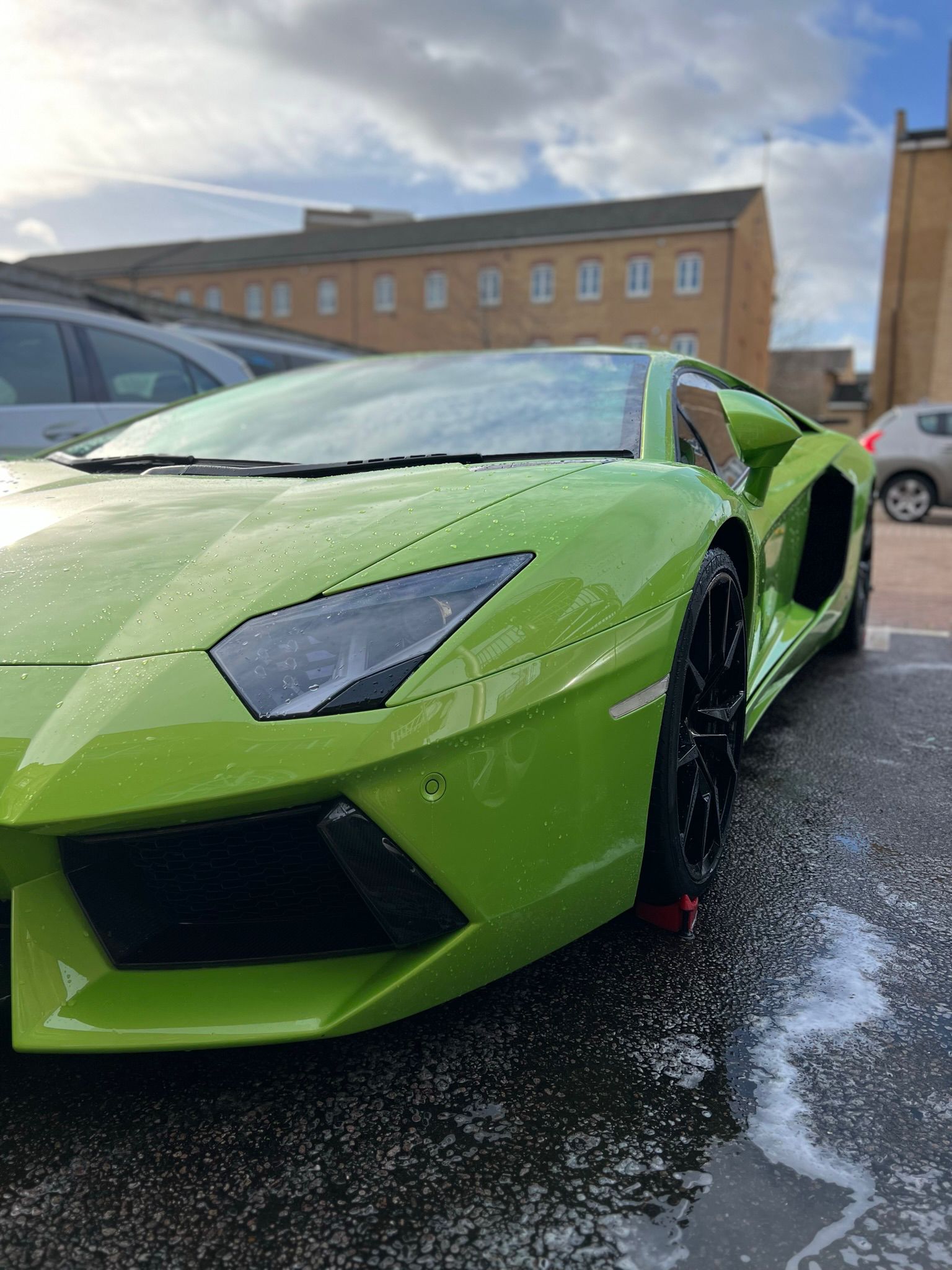 Lamborghini super car front view after wash for valet and coating by JP detailing and dents in Essex