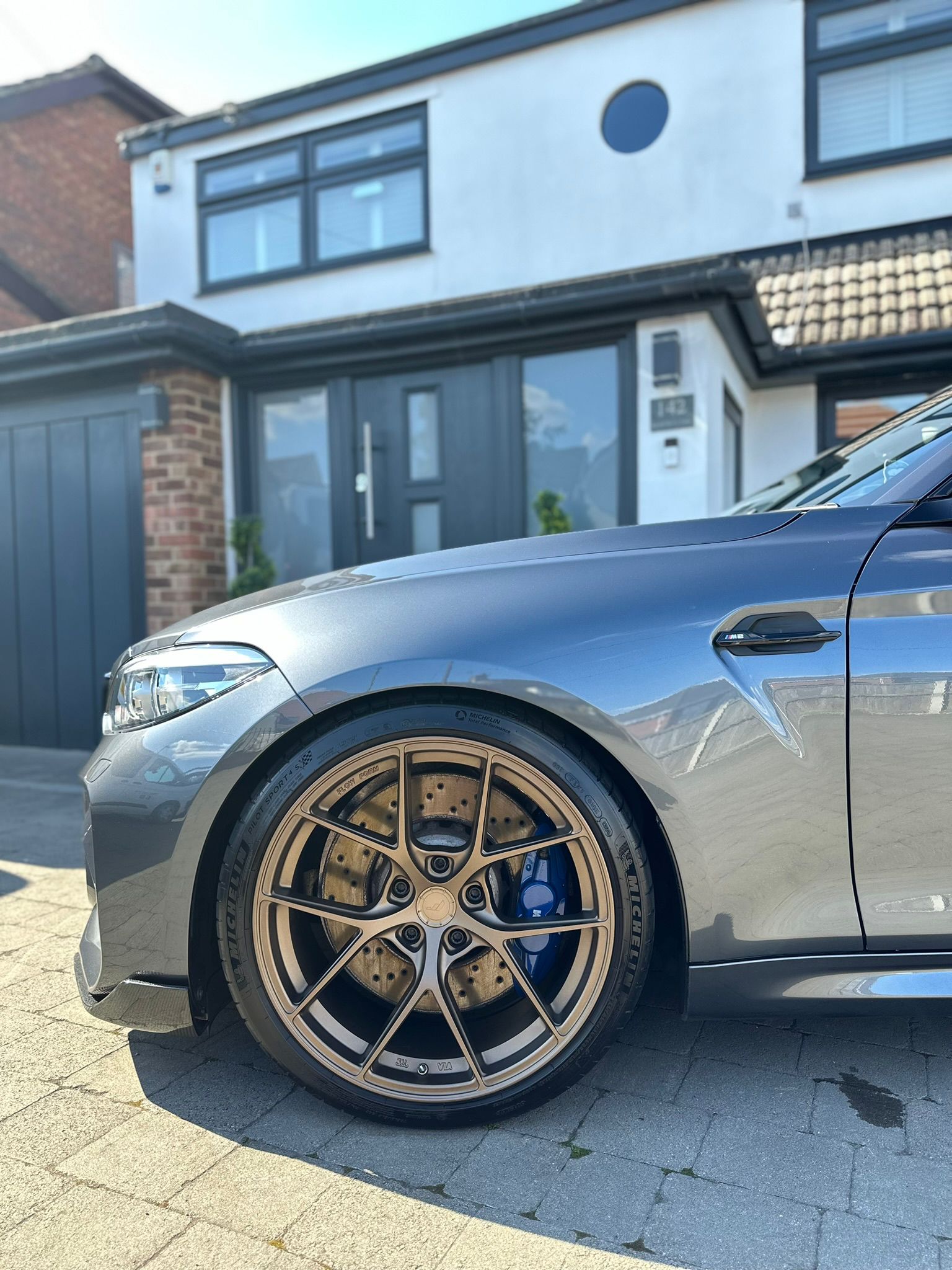 BMW side view ceramic coating and detailing in Essex by JP detail and dents